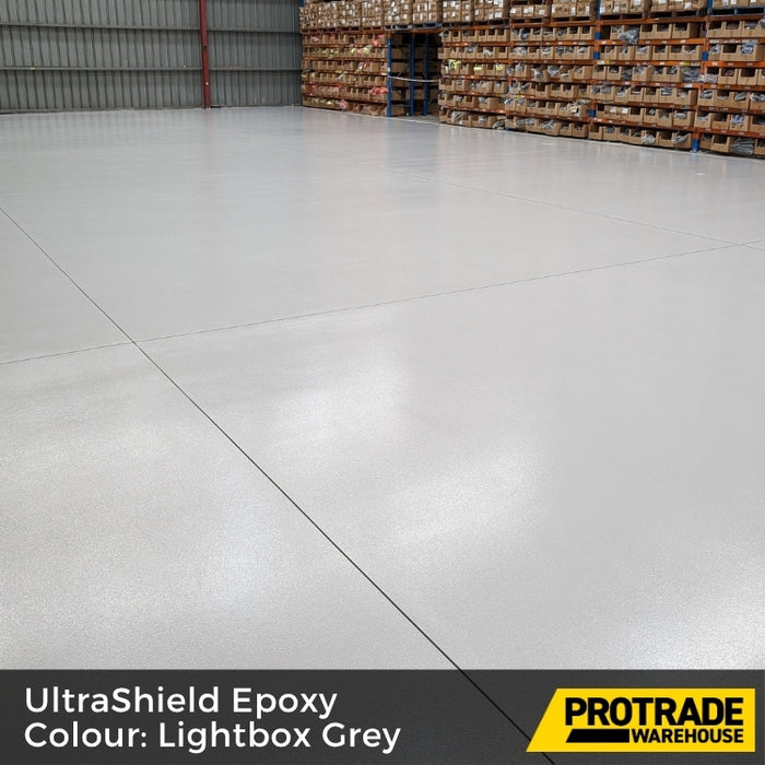 Lightbox Grey UltraShield Epoxy floor in a warehouse with Protrade Warehouse branding.